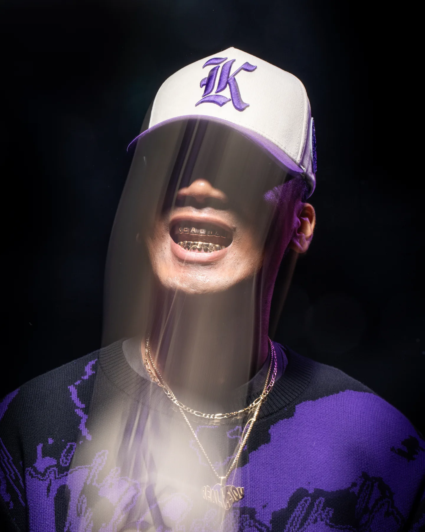 Sacramento Kings apparel portrait photographed through wet glass